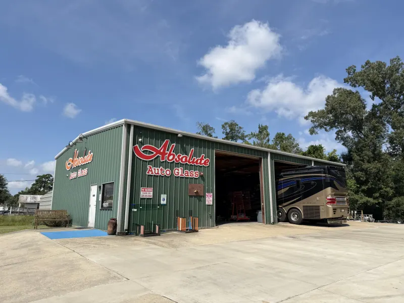 Absolute Auto Glass building with a motorhome in the service bay