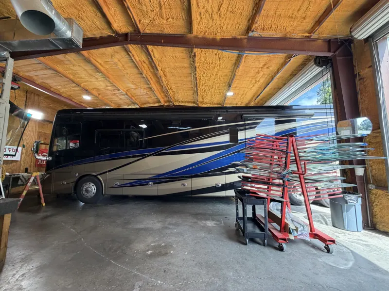 Class A motorhome in the Absolute Auto Glass workshop